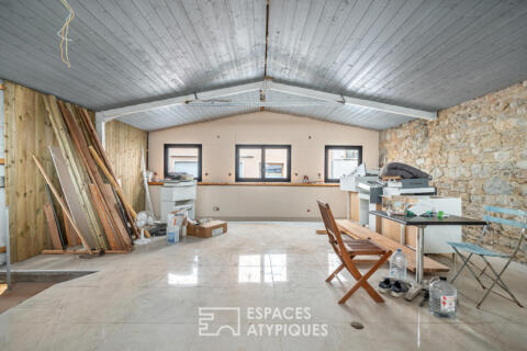 Duplex type maison de ville avec garage à réhabilter