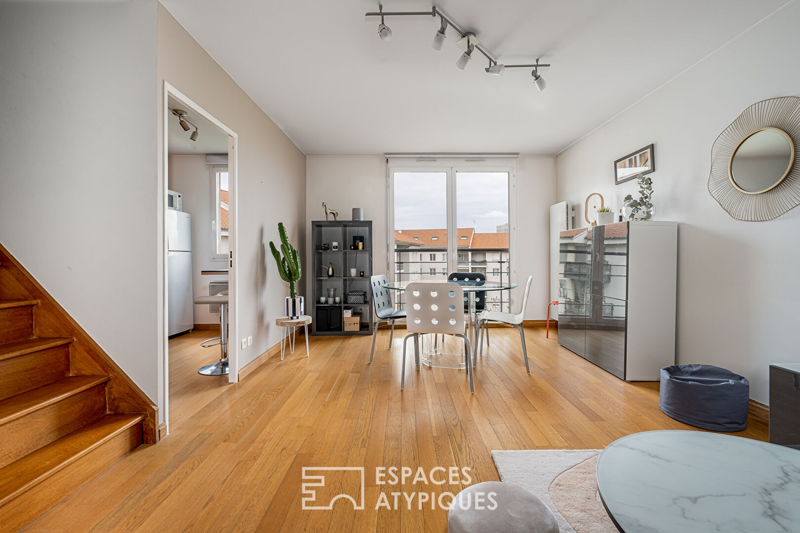 Duplex en dernier étage d’un immeuble moderne