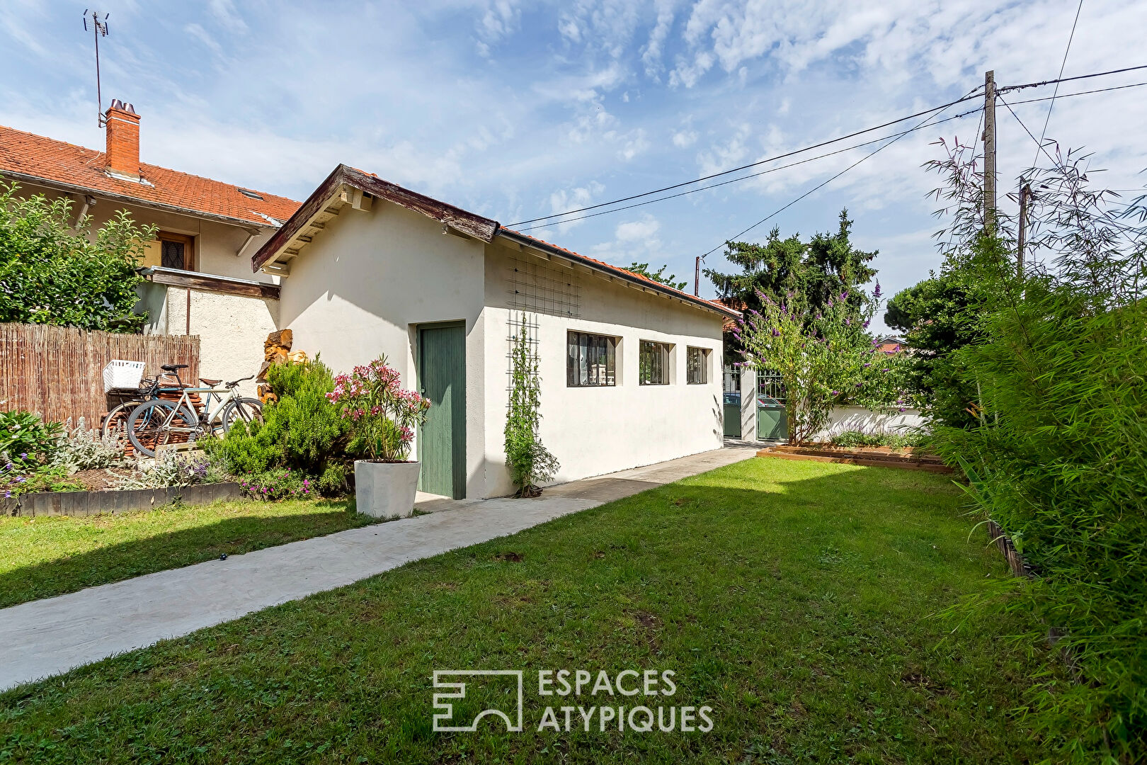 House with contemporary extension and outbuilding