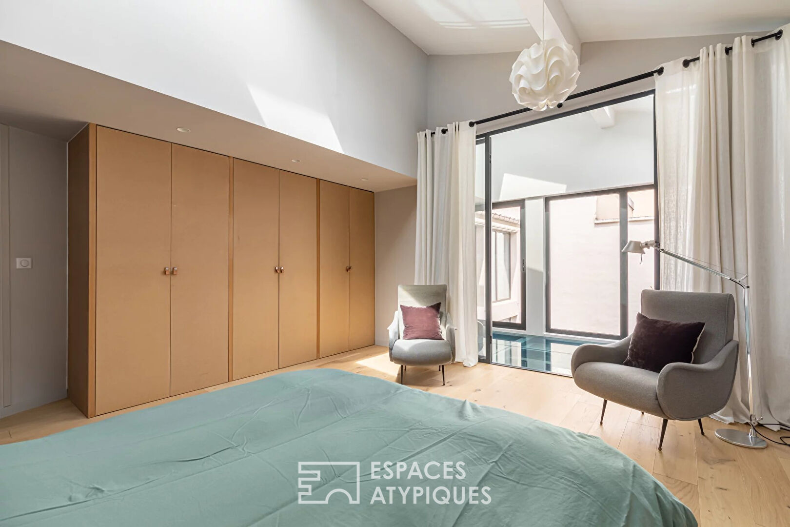 Loft with terrace in a former school