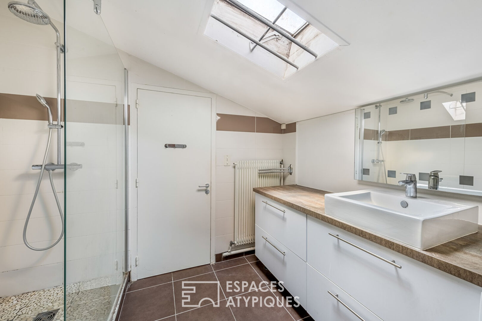 Duplex rénové en dernier étage