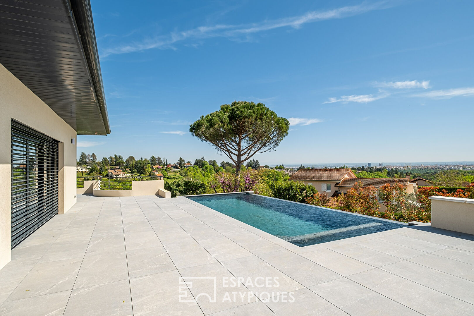 Contemporary with view of Lyon and infinity pool