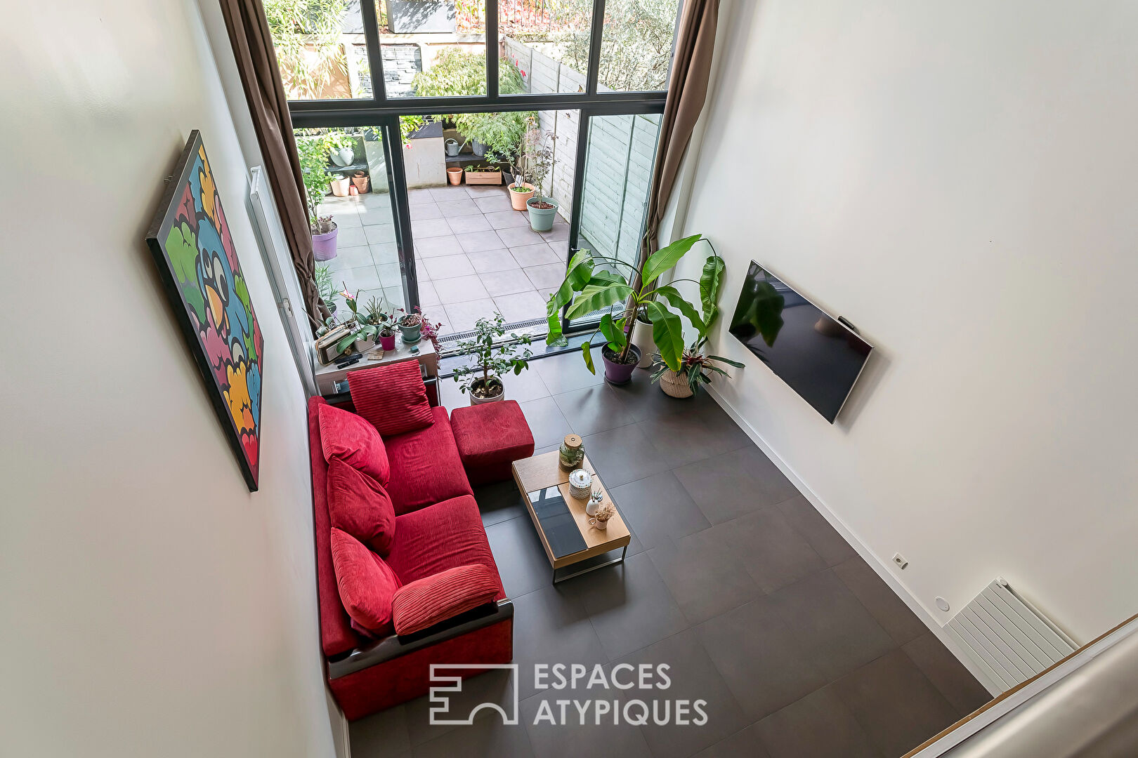 Loft avec terrasse dans un ancien atelier