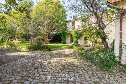House with garden and outbuilding