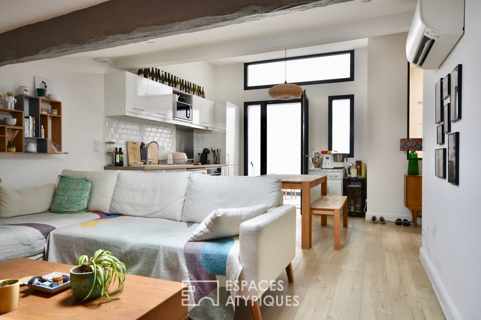 Appartement avec patio sous les toits