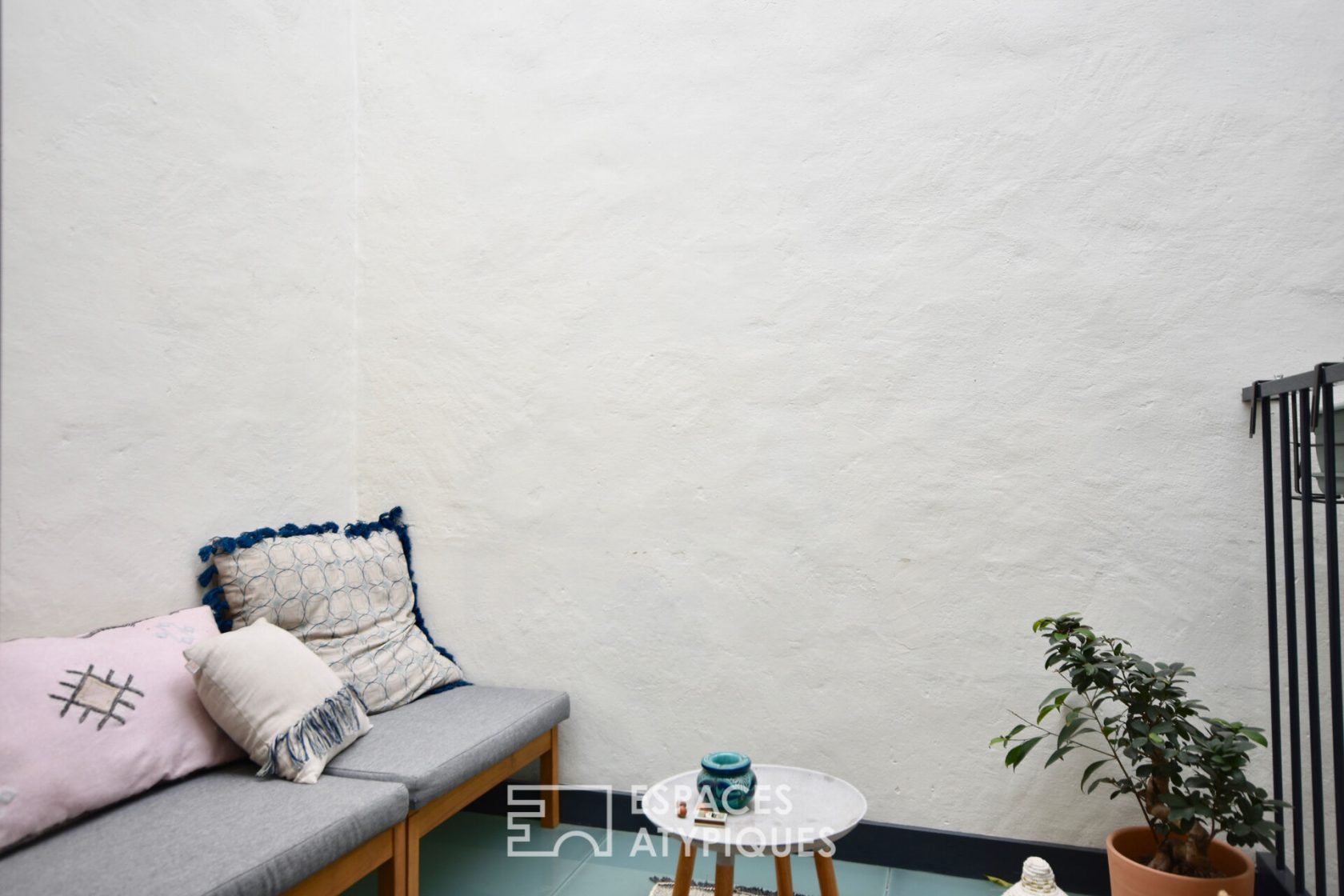 Appartement avec patio sous les toits