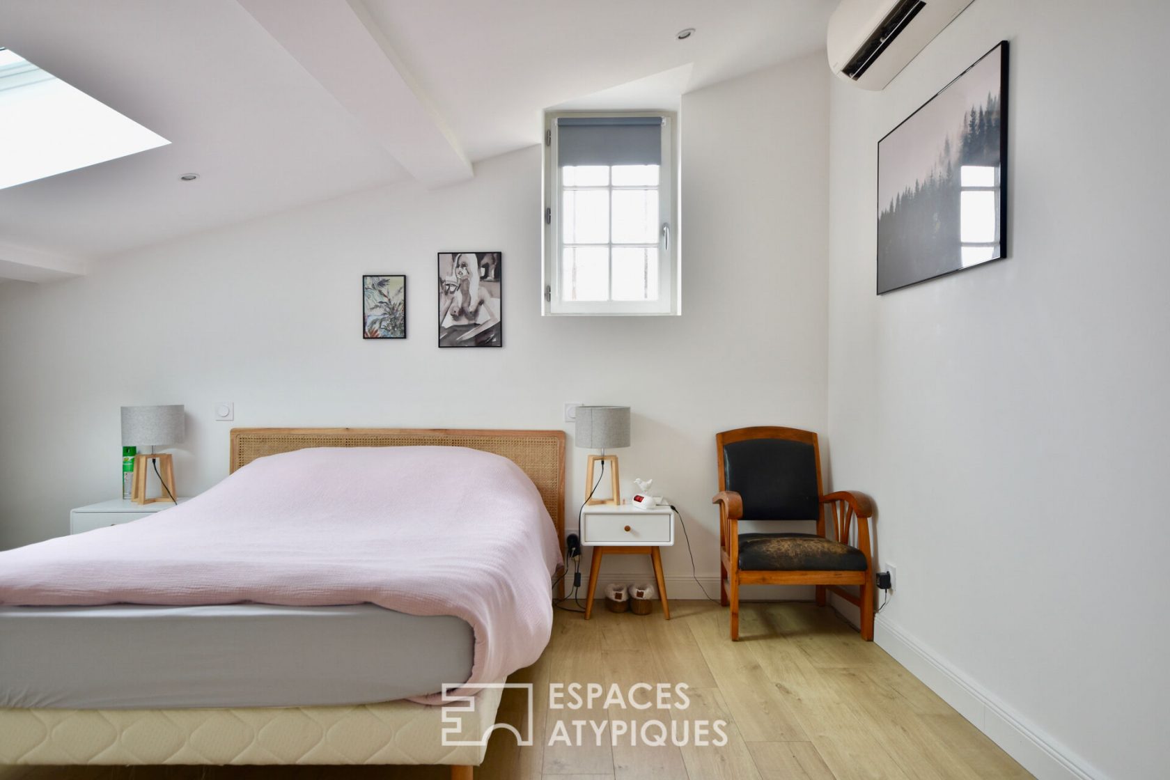 Appartement avec patio sous les toits