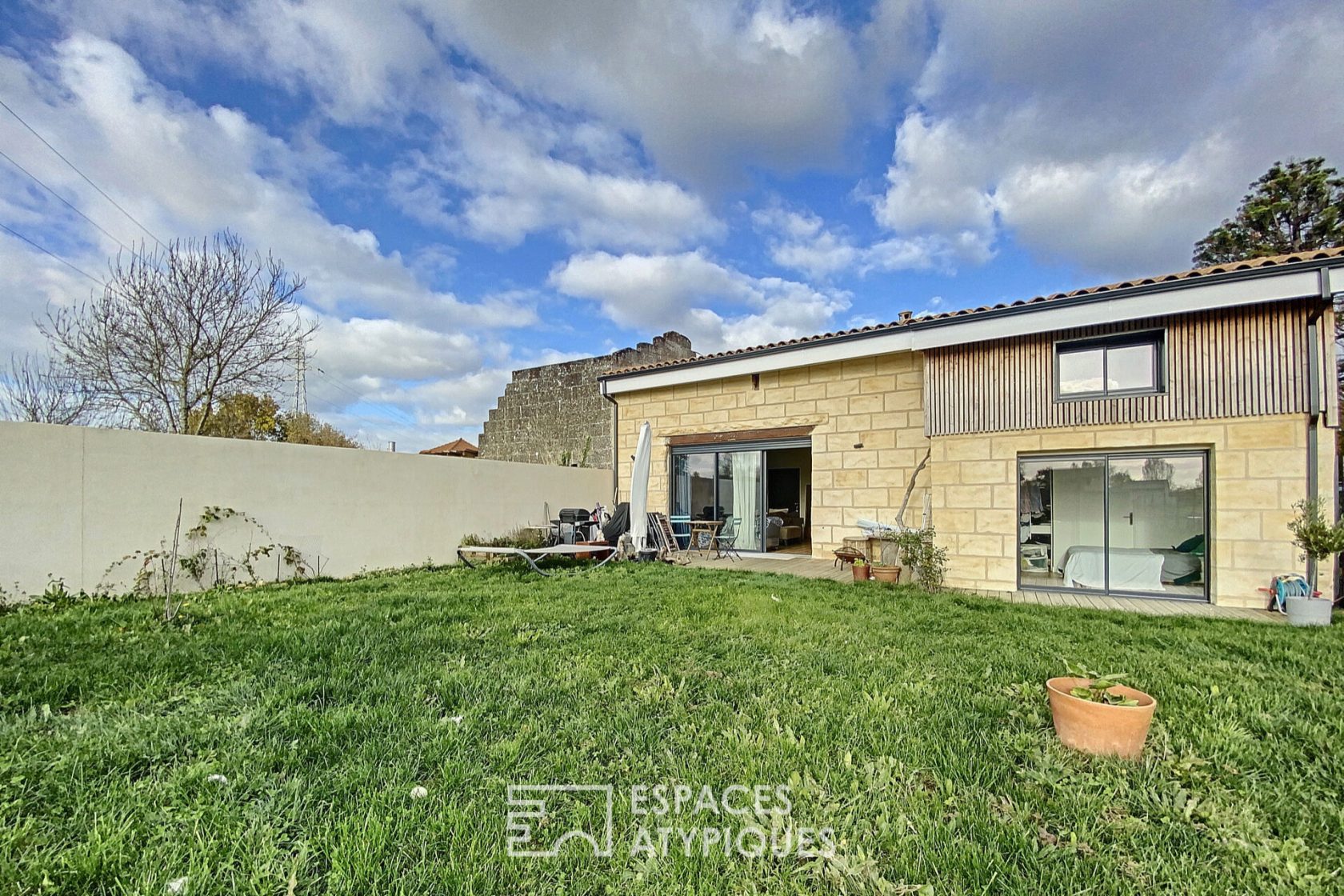Stone house renovated loft style with garden