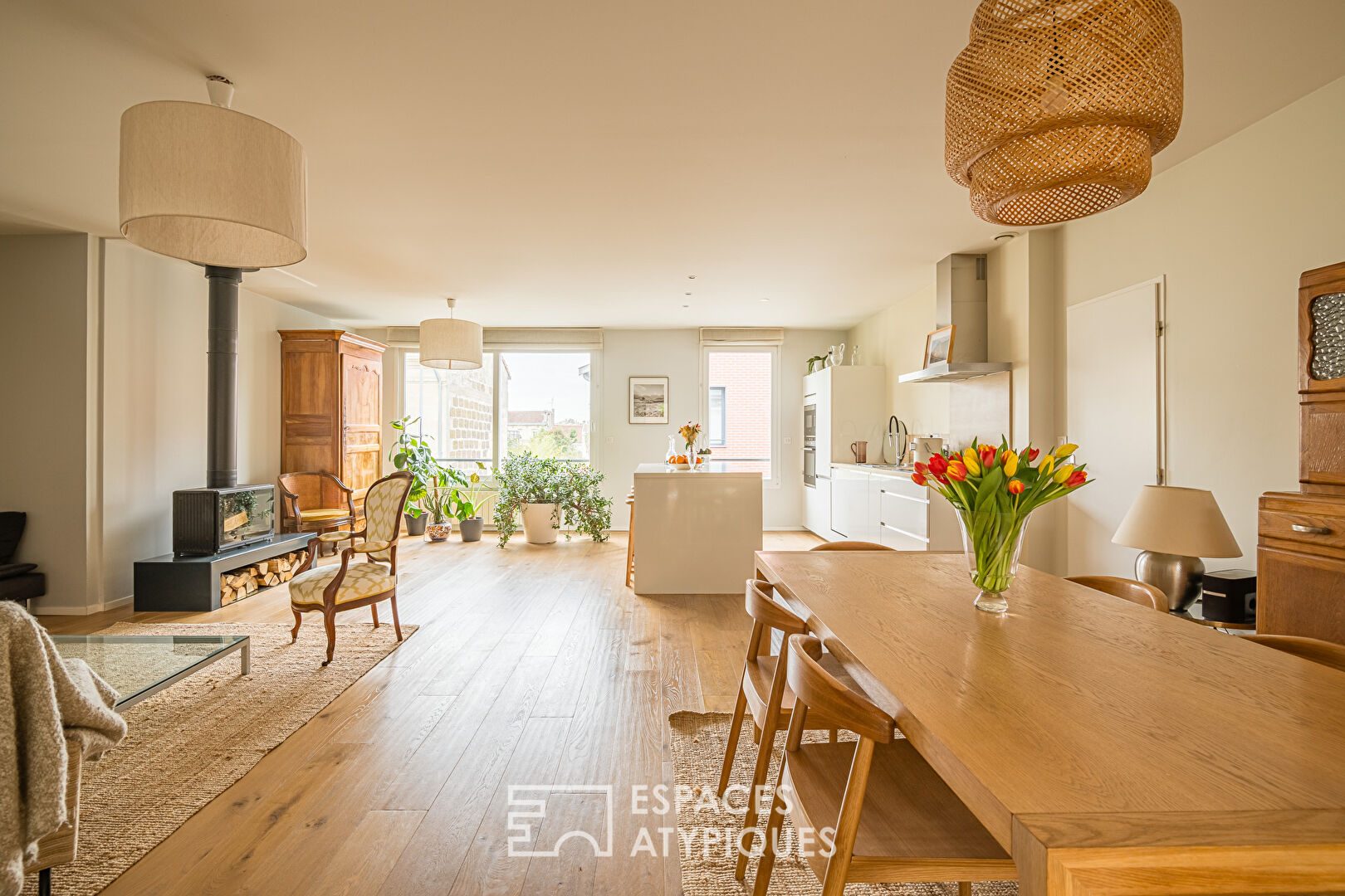 Former car garage transformed with terrace and garage