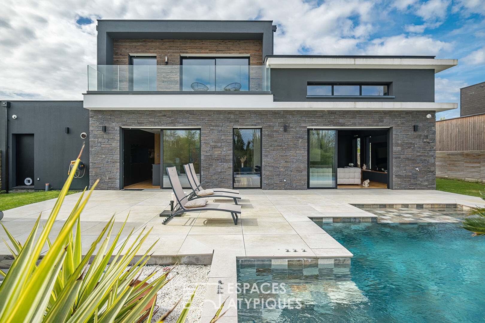 Contemporary architect-designed villa with lake view