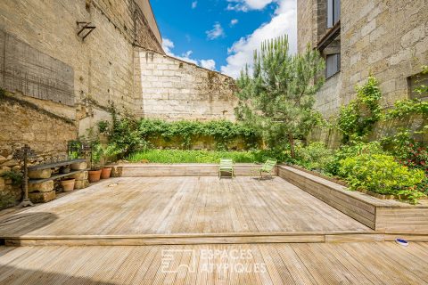 Appartement avec grand jardin et caves