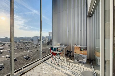 Appartement type loft avec terrasse et parking