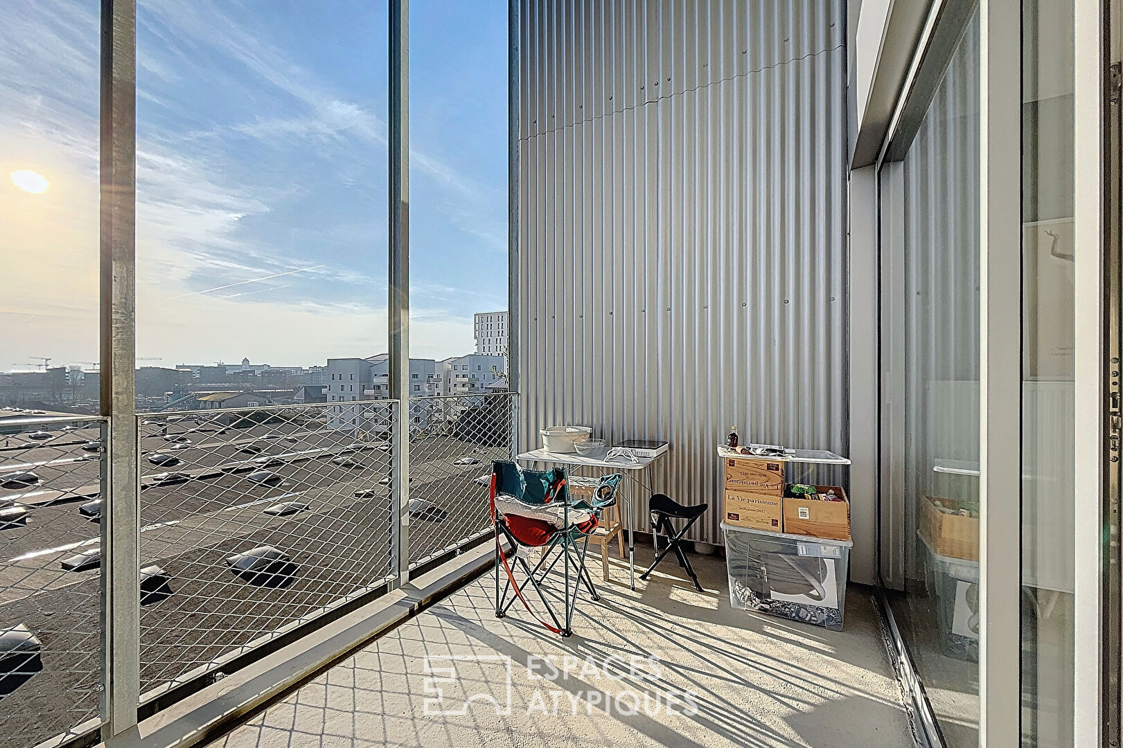 Appartement type loft avec terrasse et parking