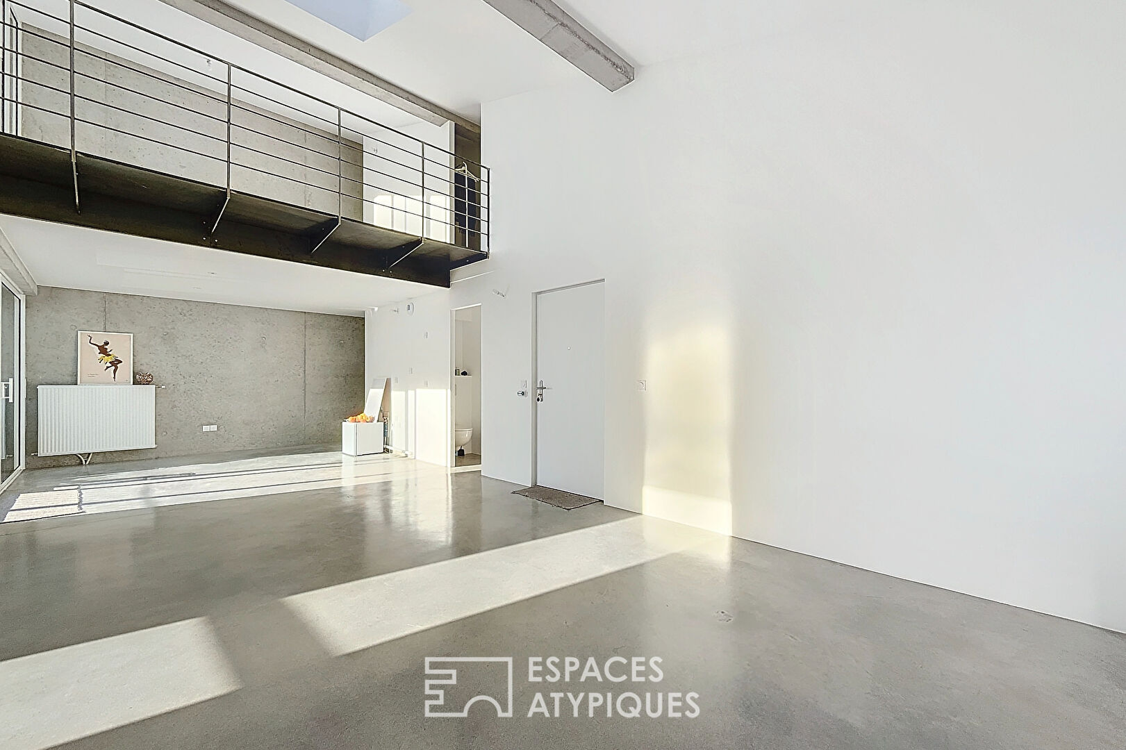 Appartement type loft avec terrasse et parking