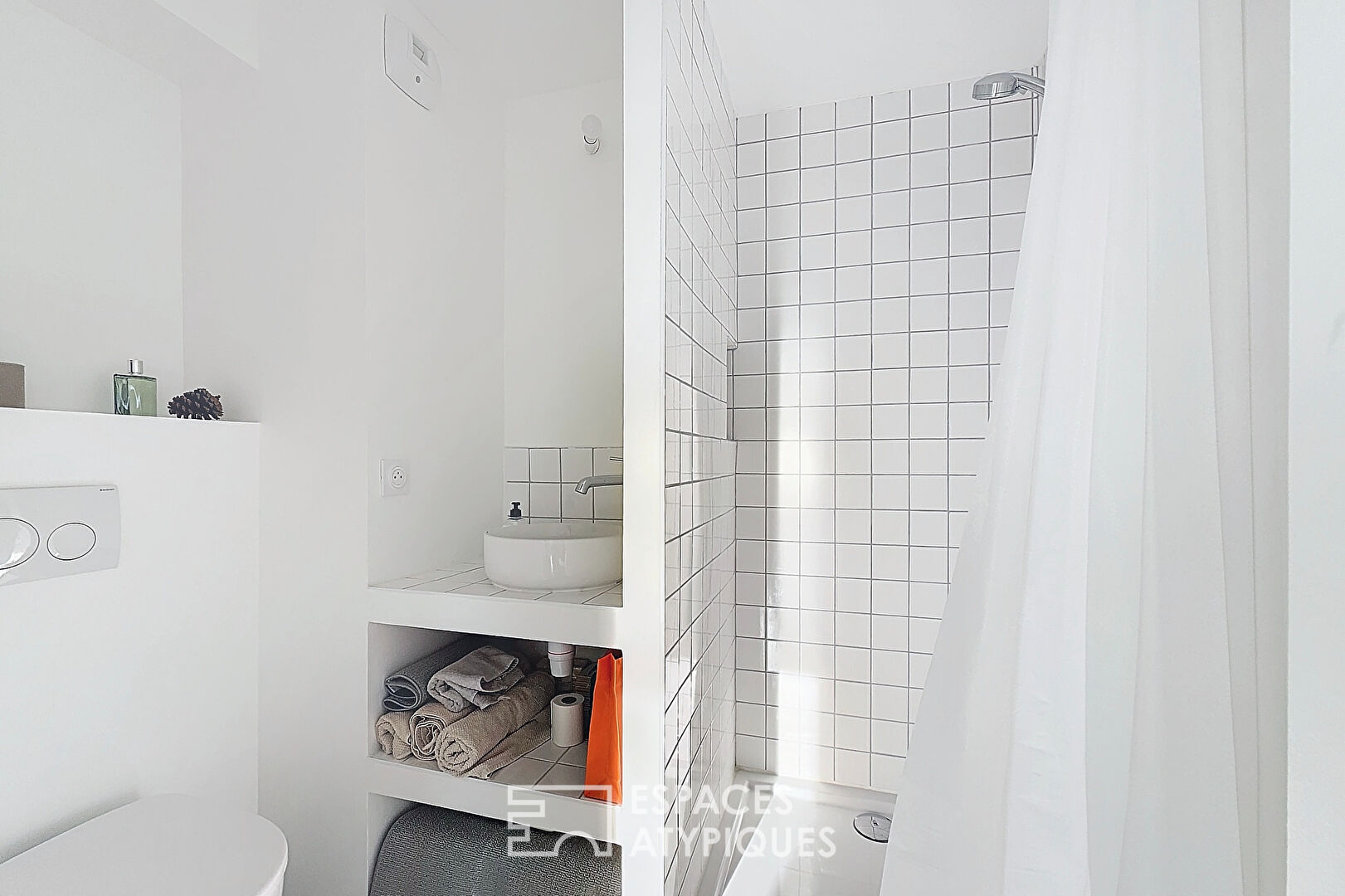 Appartement type loft avec terrasse et parking