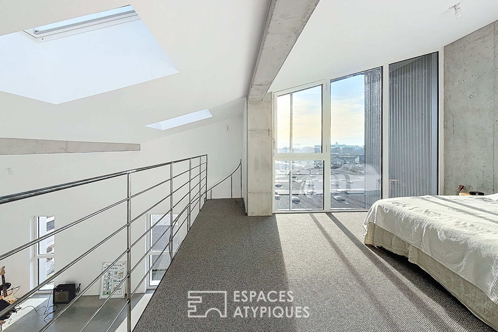 Appartement type loft avec terrasse et parking