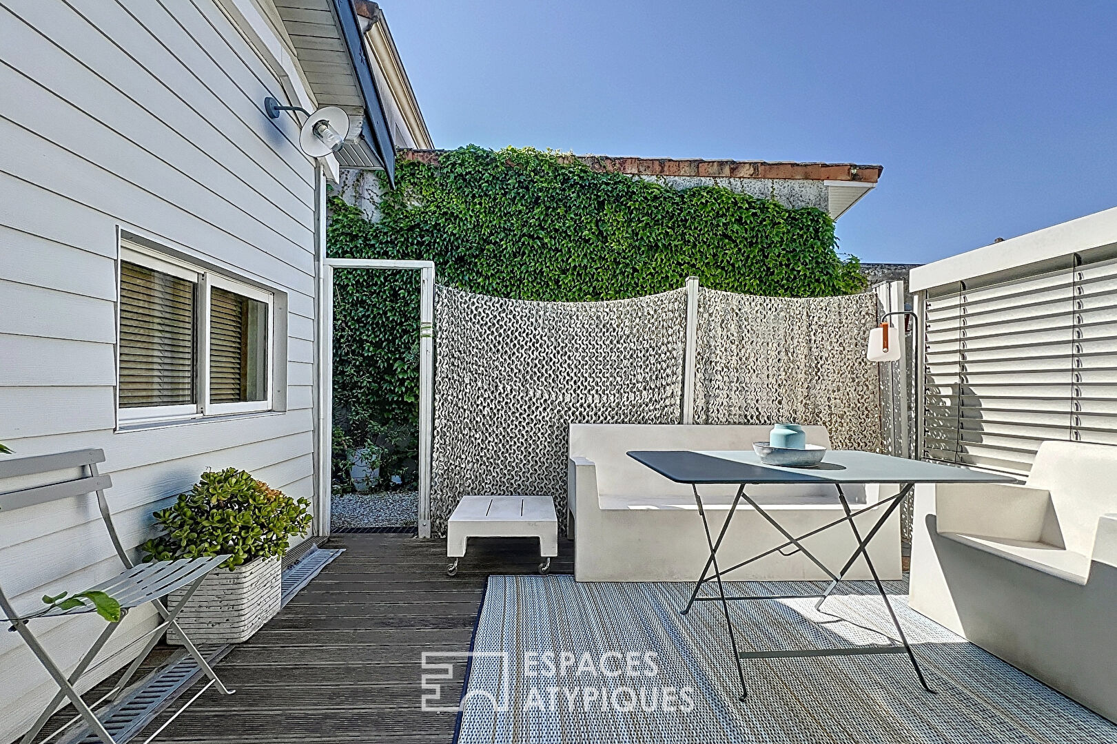 Appartement avec terrasse style cabane de plage