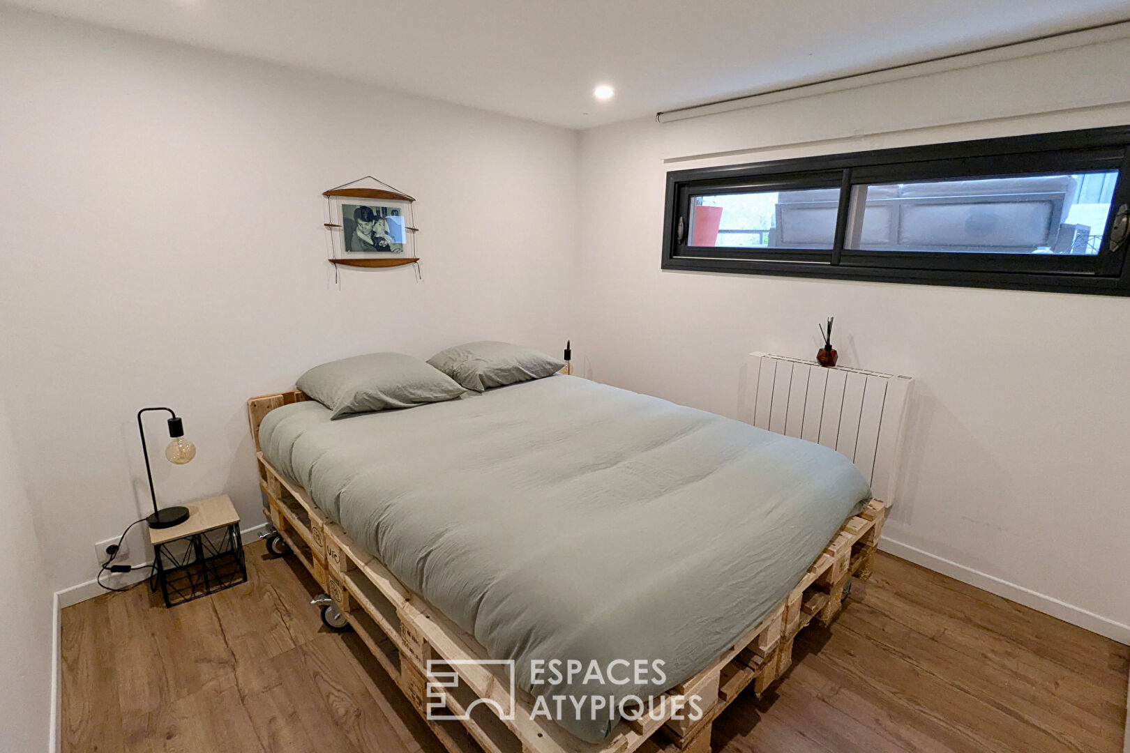 Shop-style house with outdoor space, outbuilding and garage