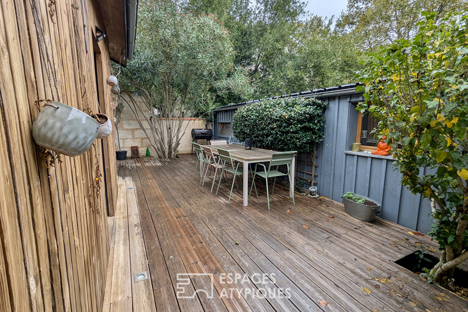 Shop-style house with outdoor space, outbuilding and garage