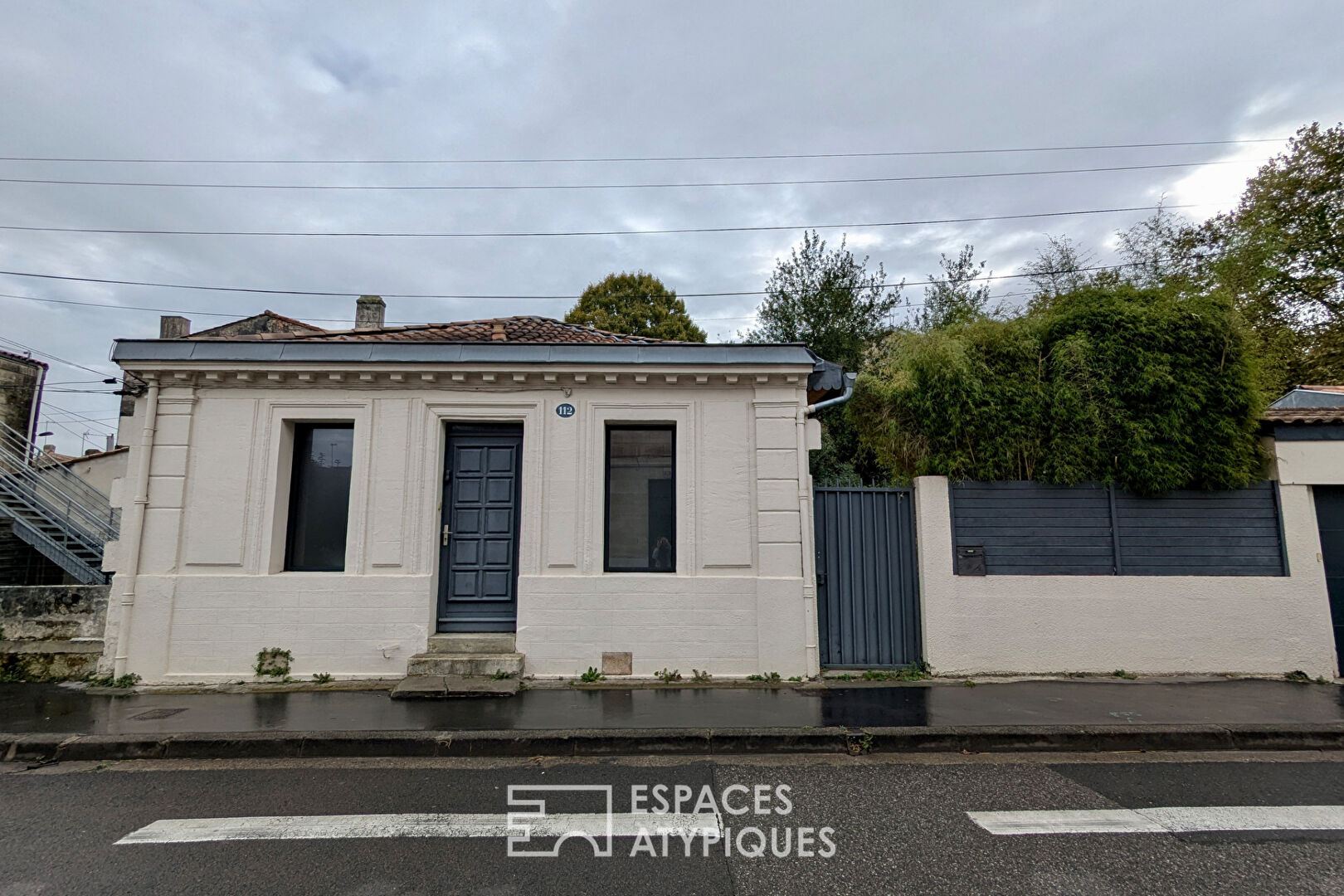 Shop-style house with outdoor space, outbuilding and garage