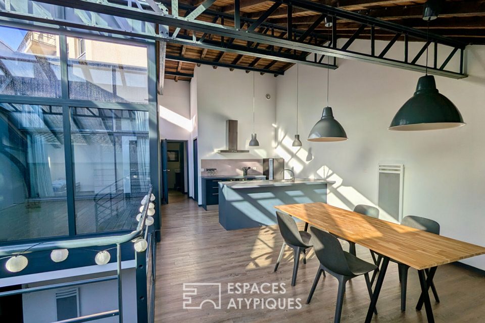 Loft industriel meublé en face du Parc Rivière