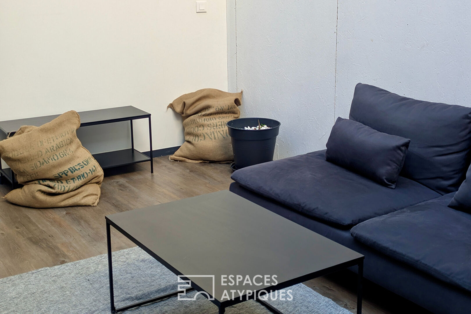 Loft industriel meublé en face du Parc Rivière