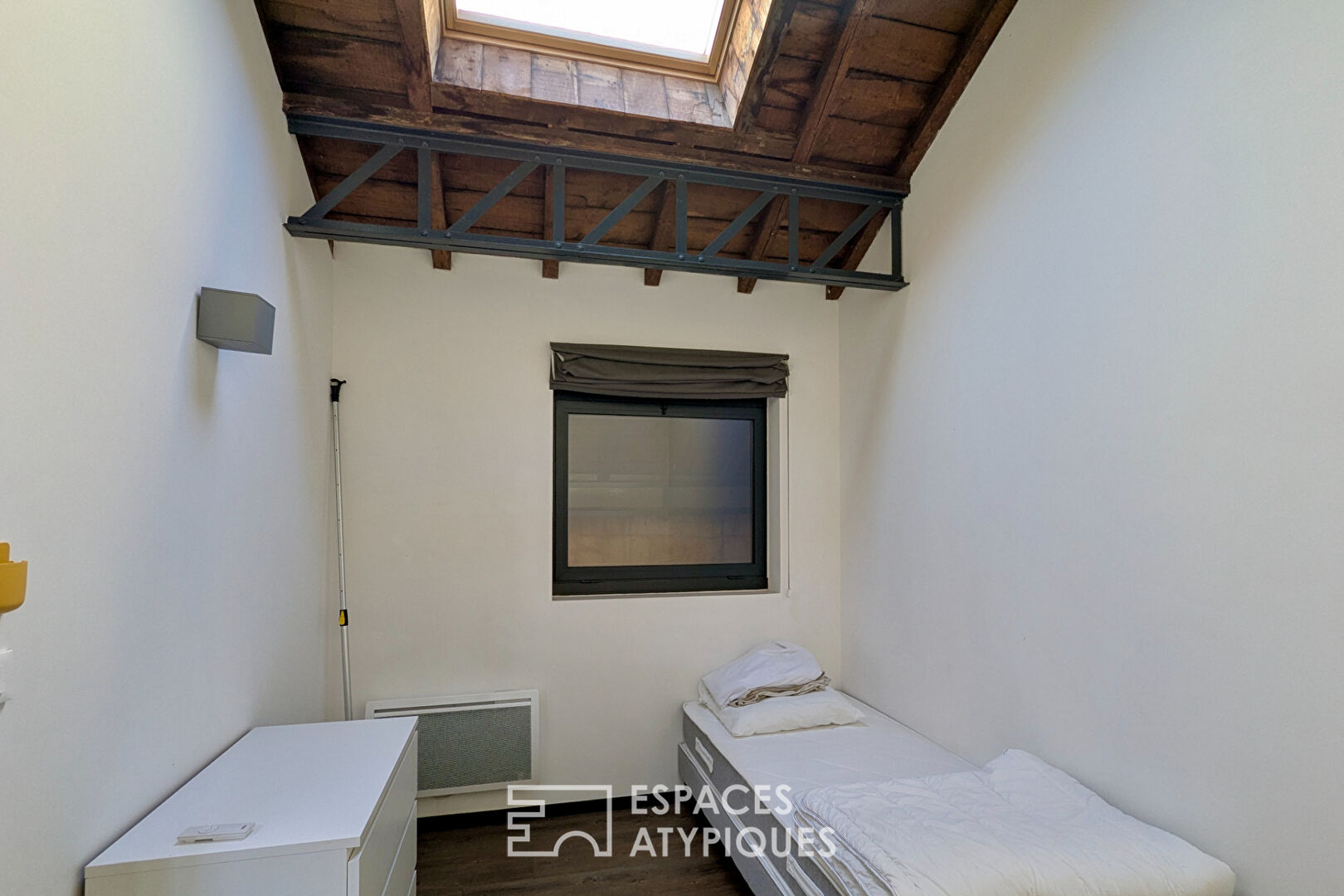 Loft industriel meublé en face du Parc Rivière