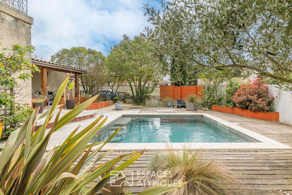 Maison en pierre au passé viticole avec jardin et piscine