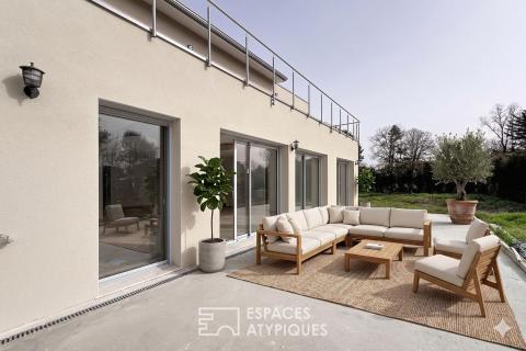 Maison neuve avec jardin et garage