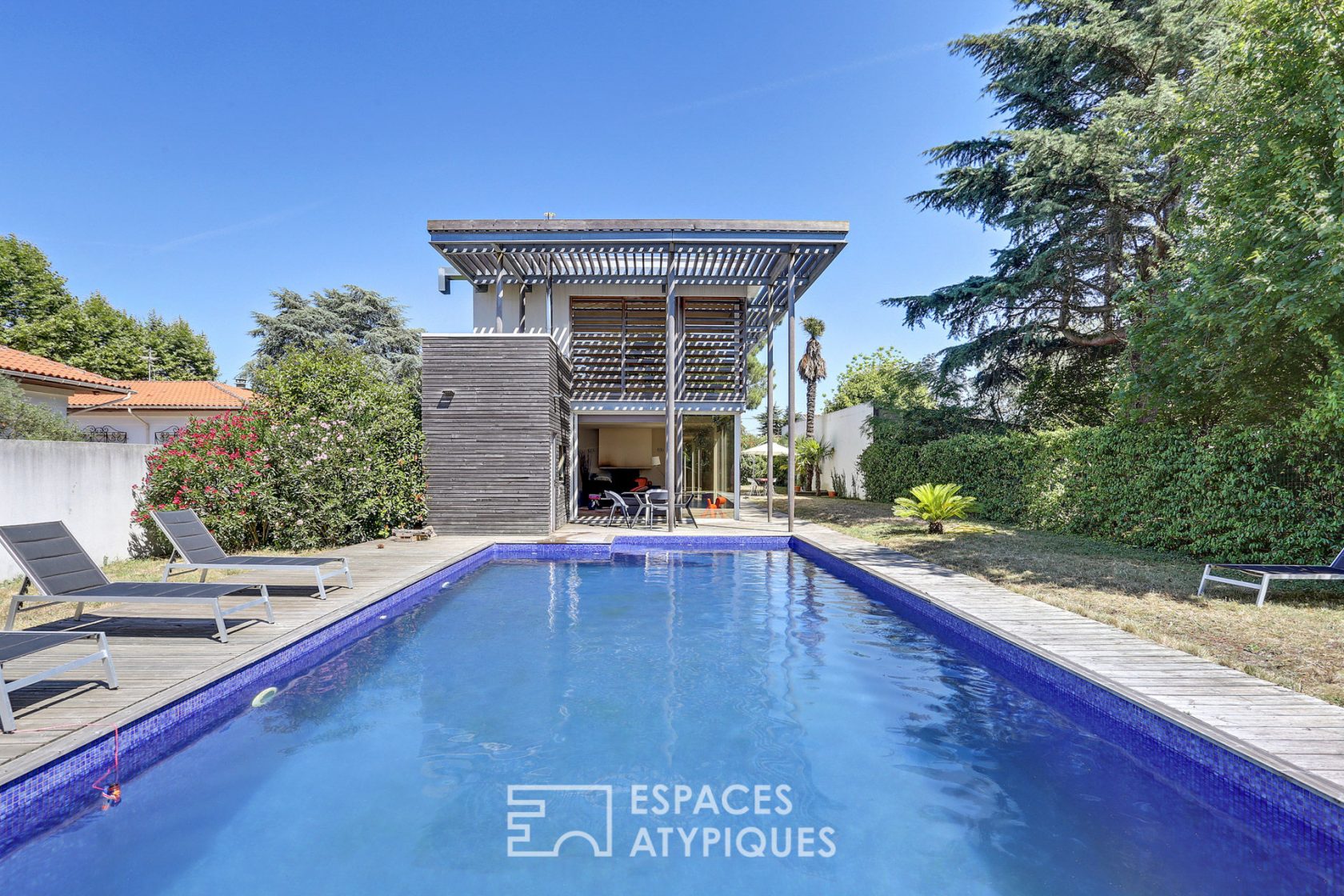 Architect house with pool and garden