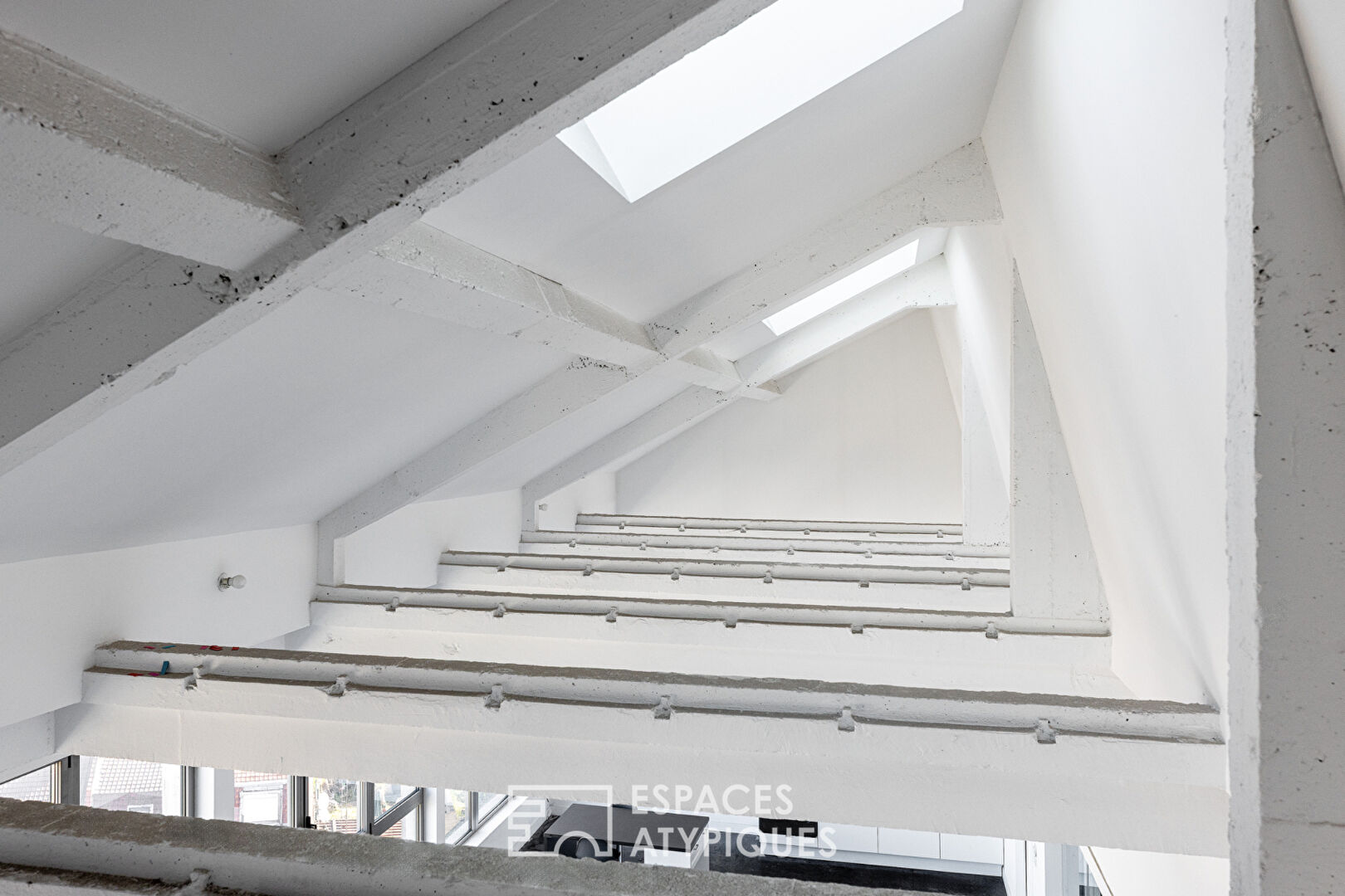 Loft brut à aménager avec rooftop à Roubaix