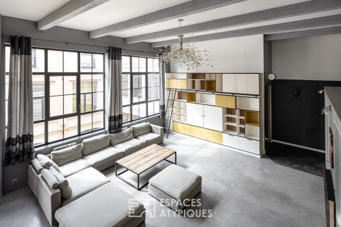 Loft industriel avec rooftop vues sur les toits de Roubaix