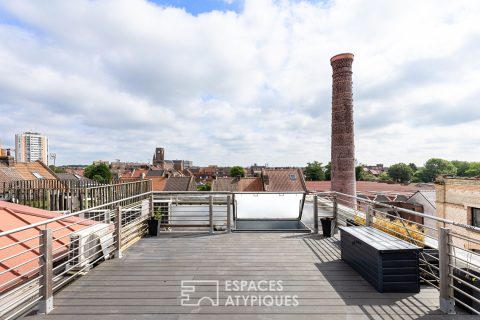 Loft industriel avec rooftop vues sur les toits de Roubaix