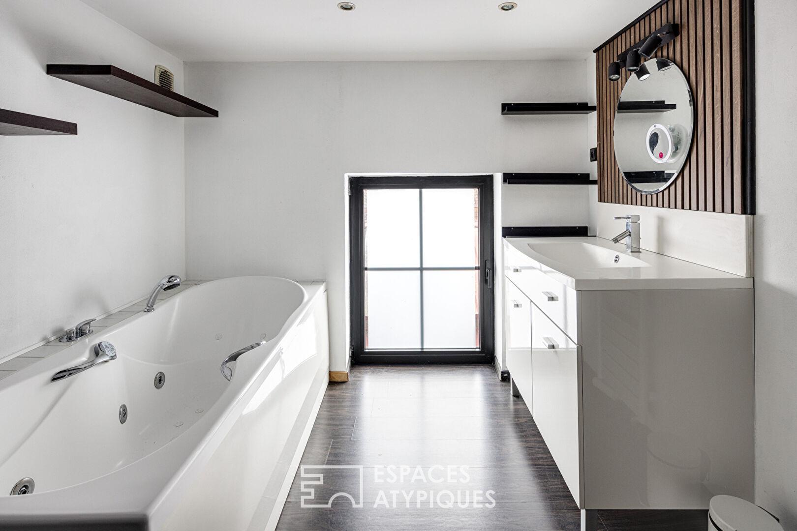 Loft industriel avec rooftop vues sur les toits de Roubaix