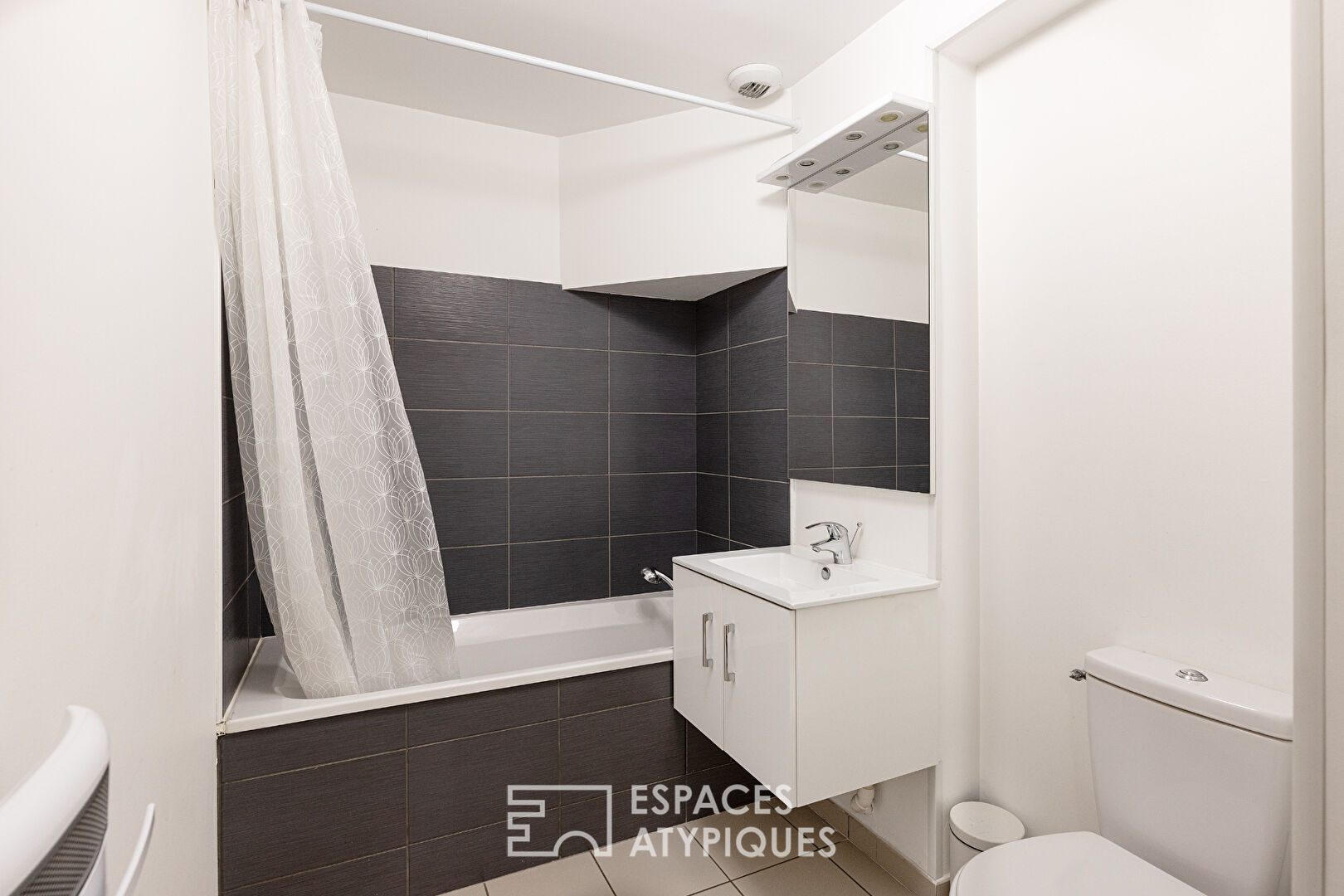 Duplex avec cachet XIXème siècle et intérieur moderne