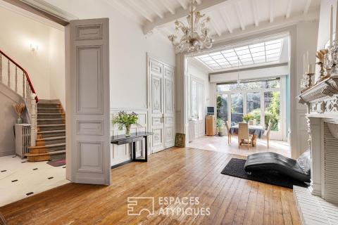 Elegant townhouse with a wooded garden and old-world charm
