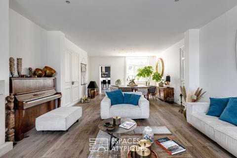 Family home with multiple volumes and a garden