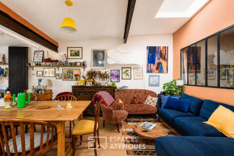 Loft avec terrasse paysagée dans une ancienne maison-boutique ouvrière