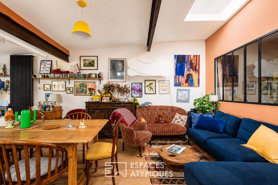 Loft avec terrasse paysagée dans une ancienne maison-boutique ouvrière