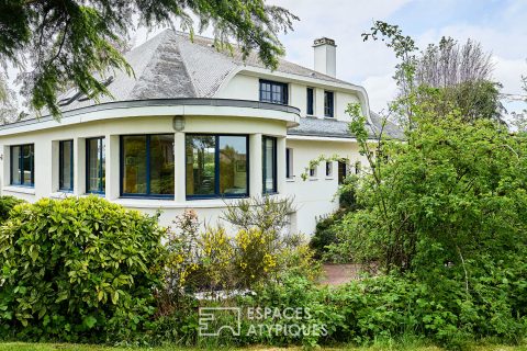 Maison des années 60 avec extension et jardin arboré