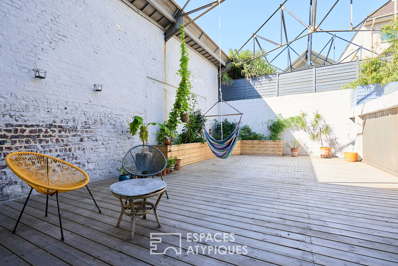 Véritable loft avec terrasse