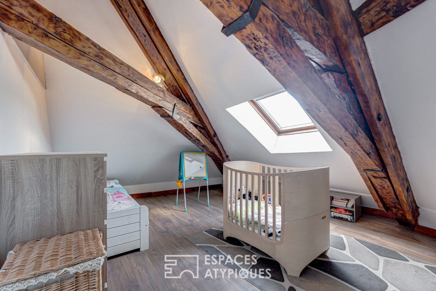 Triplex atypique en dernier étage