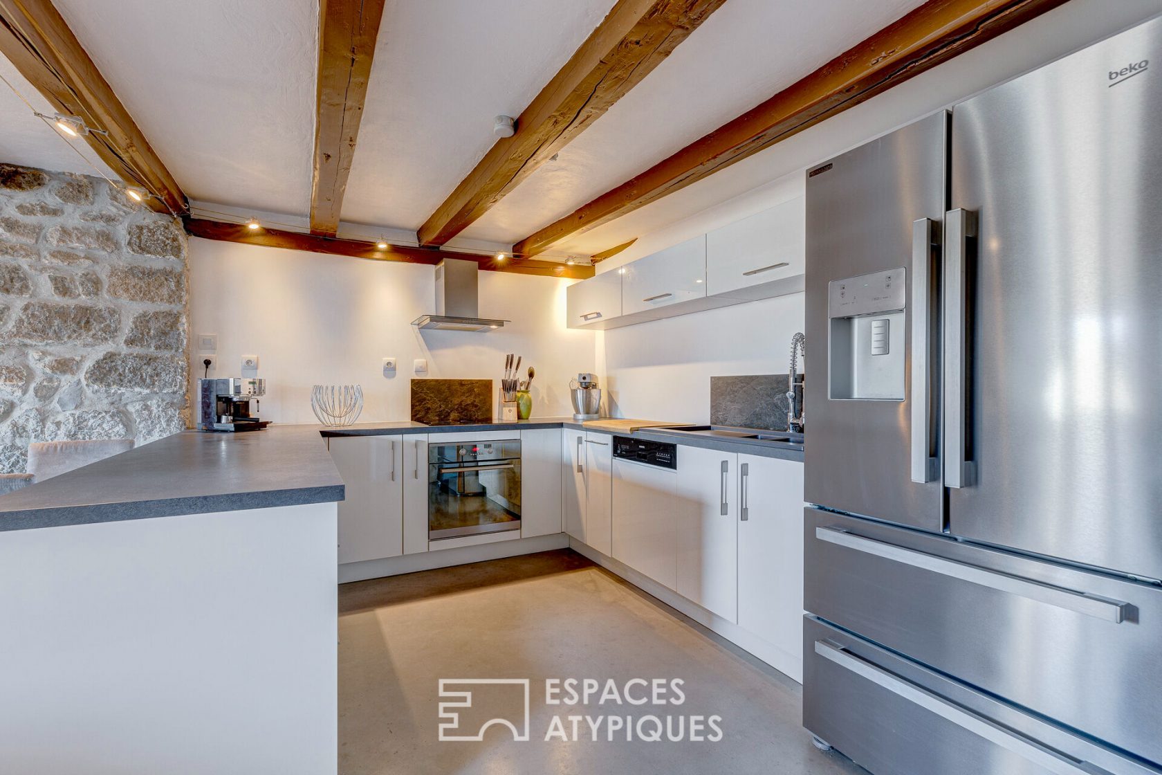 Triplex atypique en dernier étage