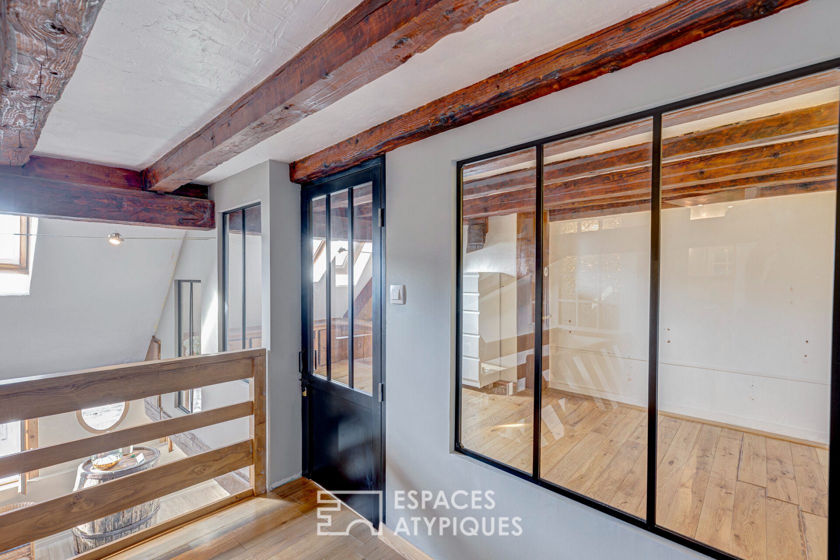 Triplex atypique en dernier étage