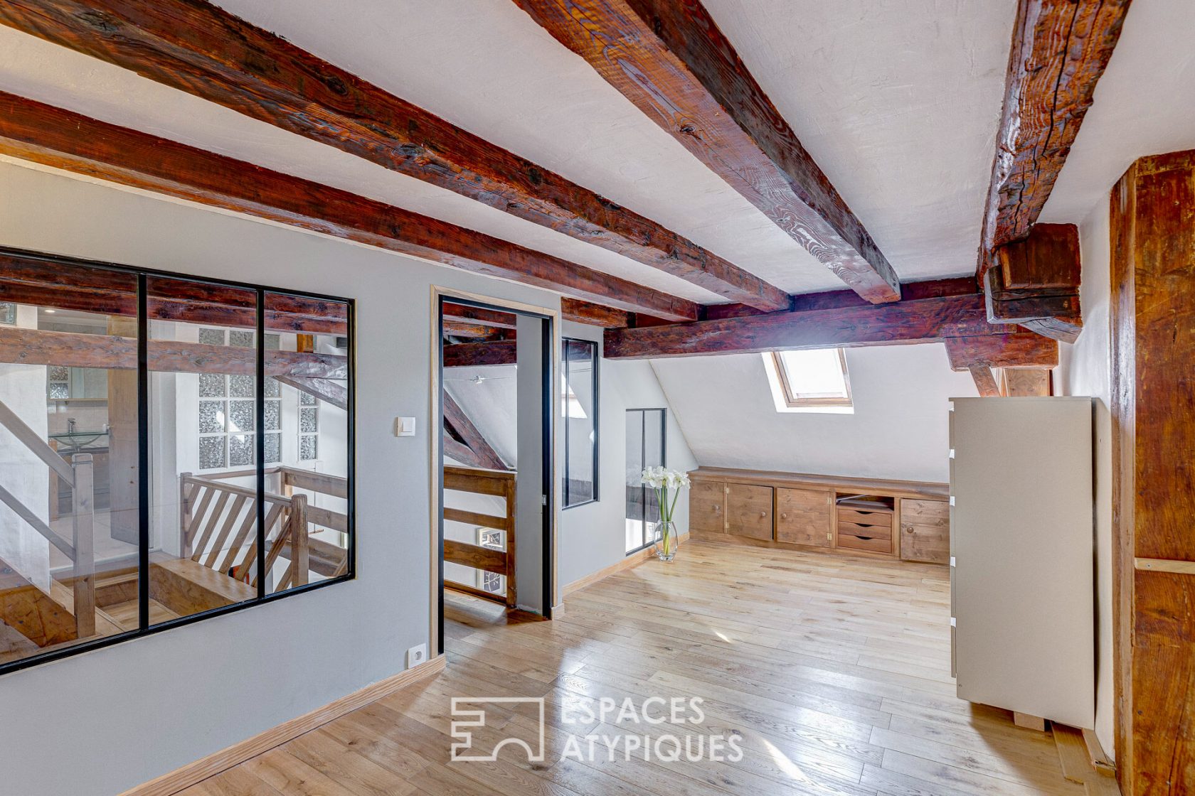 Triplex atypique en dernier étage