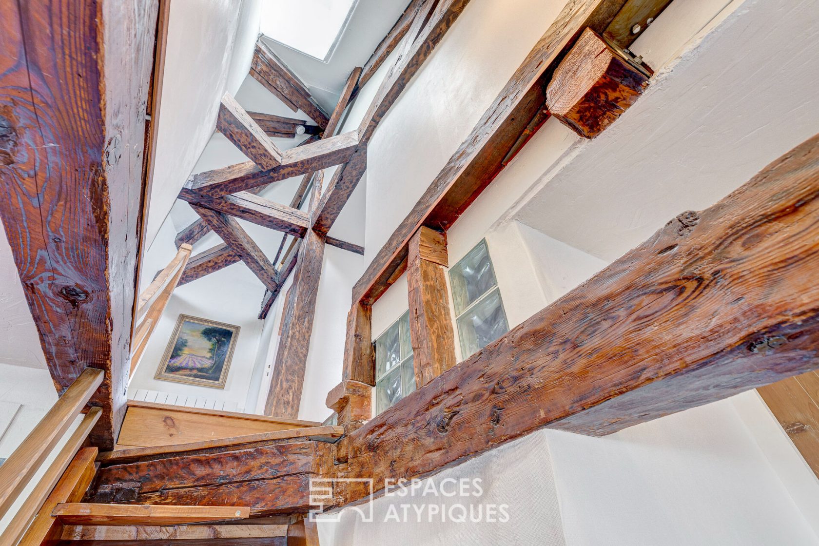 Triplex atypique en dernier étage