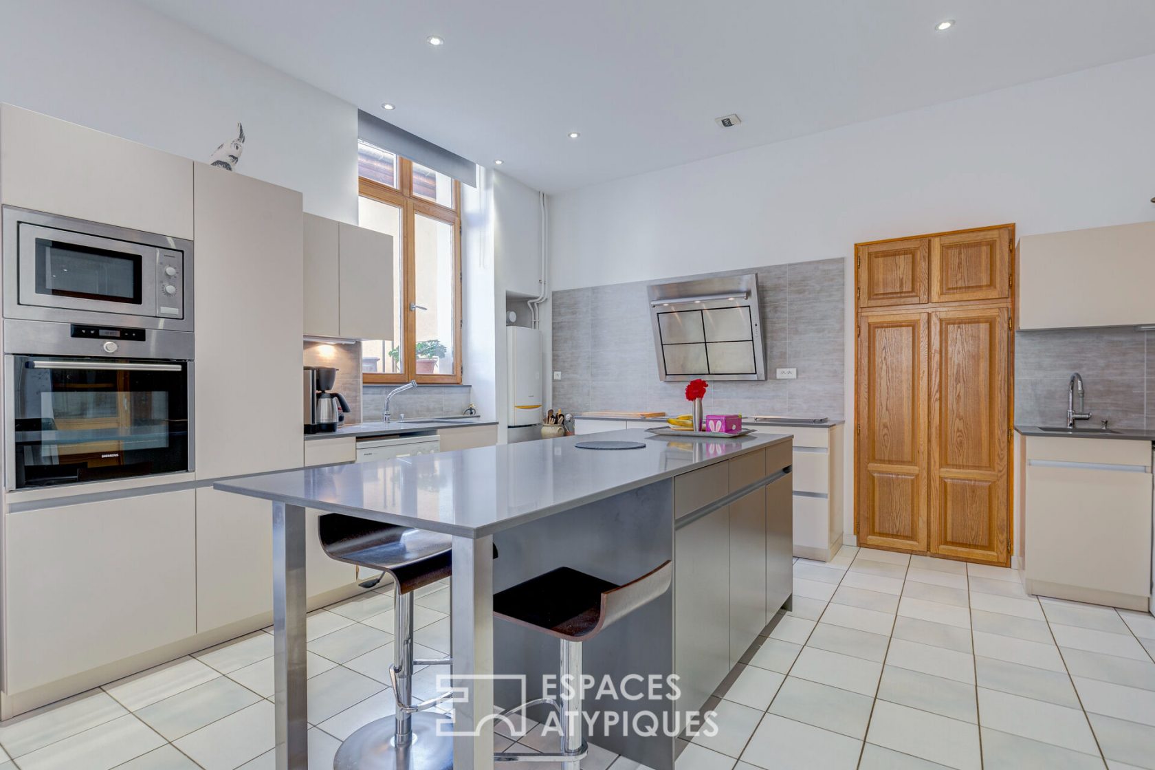 Appartement terrasse aux beaux volumes