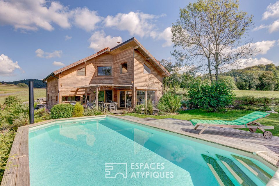 01300 CHAZEY BONS - Maison d'architecte ossature bois avec piscine - Réf. 1141EA