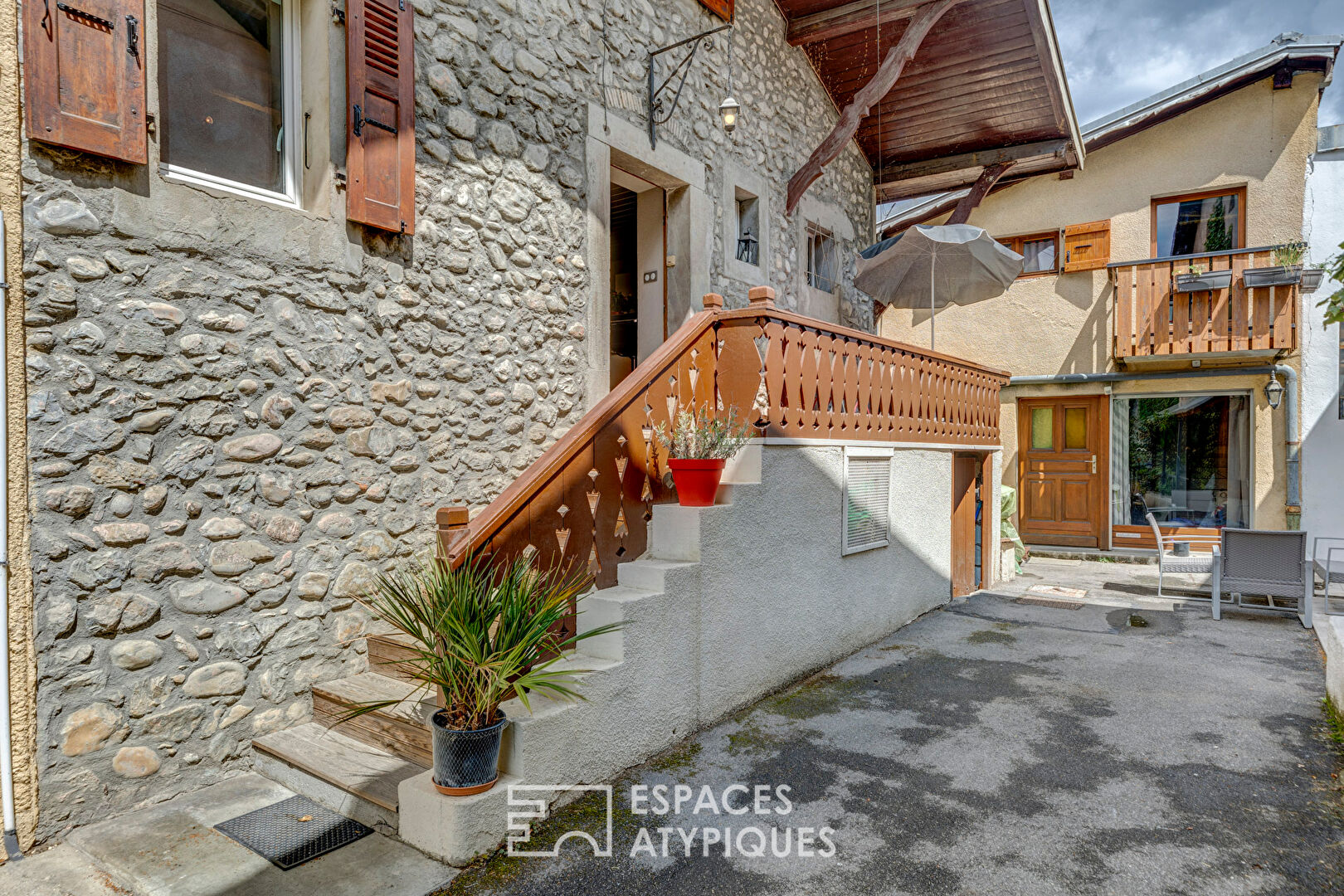 Village house with courtyard outbuilding