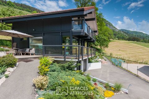 Contemporary wooden chalet with a view